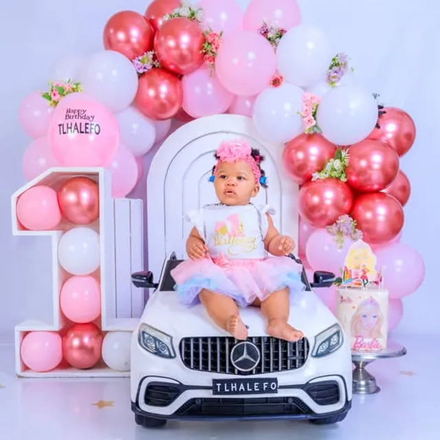 First birthday cake smash session, pink and navy balloon arch